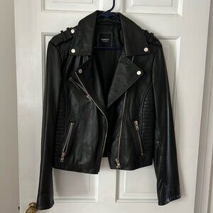 Barney’s leather jacket